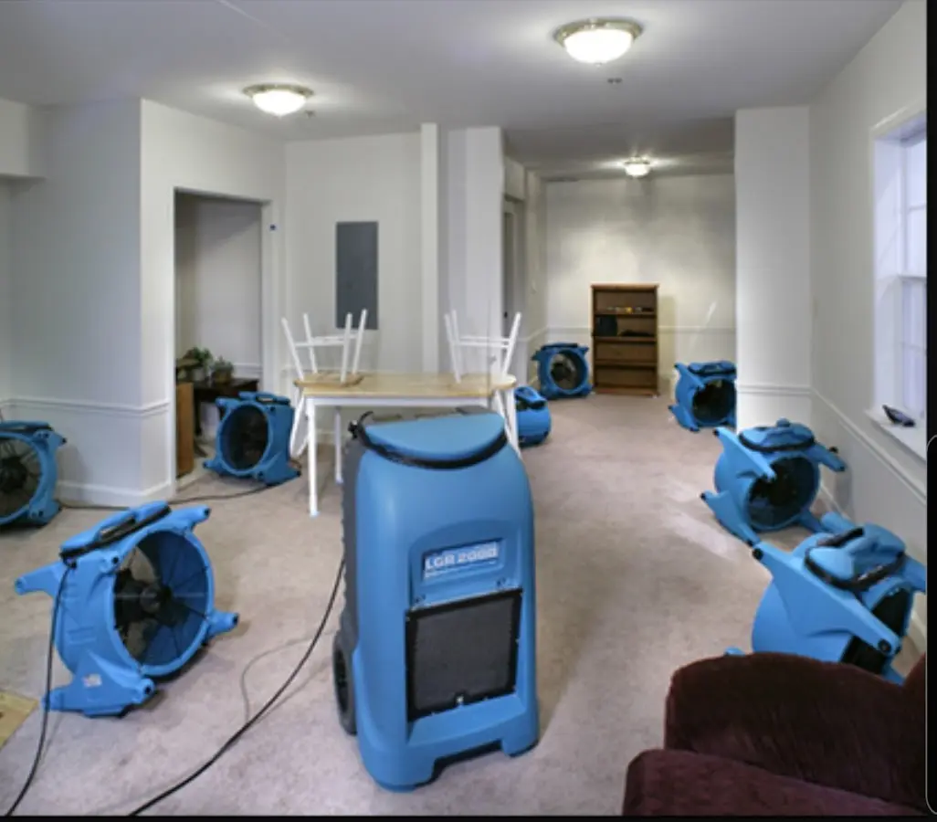 Air movers and dehumidifier setup for Water Damage Restoration in Bright